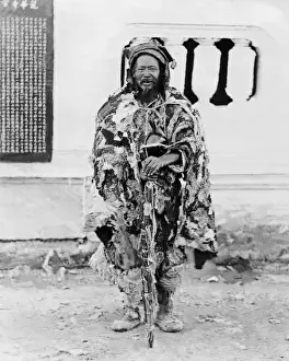 Begging Prints: Beggar in ragged clothes, China
