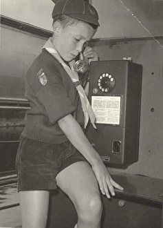 Belgian boy scout in phone box