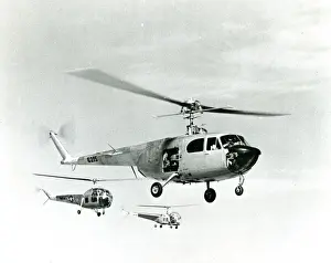 Bell Model 48 XR-12, 46-215, in the foreground, Bell XH-?
