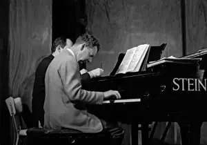 Benjamin Britten working on his score