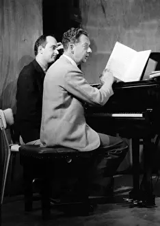 Benjamin Britten working on his score