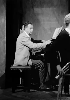 Benjamin Britten working on his score