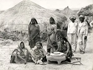 Grinding Prints: Bheel or Bhil women grinding corn, India