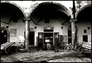 Two bikes in piazza Pisa Italy