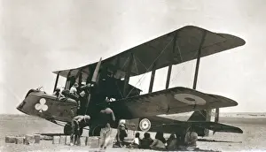 Shade Prints: Biplane bomber with crew and arabs in the desert, Iraq