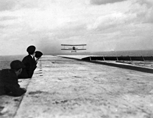 Images Dated 3rd November 2011: Biplane coming in to land on HMS Argus, WW1