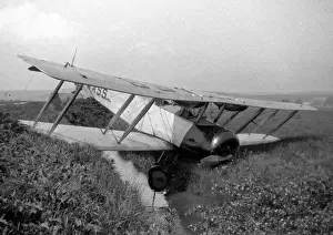 Ditch Prints: Biplane in a ditch