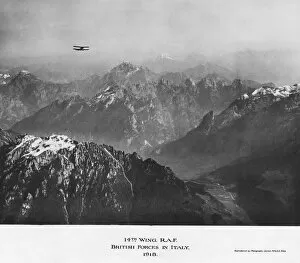 Aerial Photography Gallery: Biplane Flying over Snow-Covered Mountains 14th Wing Raf?