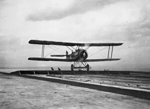 Biplane landing on HMS Argus, WW1