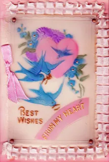 Birds, flowers and heart on a greetings card