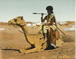 Necklaces Prints: Bisharin Man holding a spear, whilst riding his camel