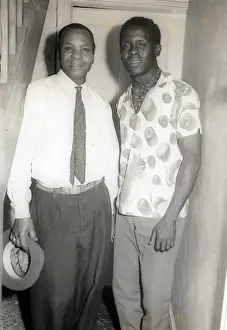Two black men under the stairs in a Nottingham house