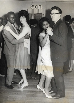 Black and white couples mixed on the dance floor in Nottingh Black and white couples mixed on the dance floor in Nottingh