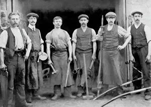 Smithy Collection: Blacksmiths outside their forge