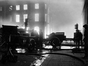Fireman with hosepipe