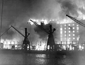 Cranes Collection: Blitz - Fire at Surrey Commercial Docks, Rotherhithe
