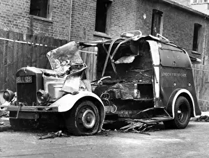 Blitz in London -- bomb damaged pump vehicle, WW2