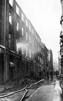 Fireman with hosepipe