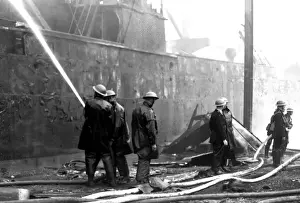 Blitz in London -- burnt out cargo ship, Rotherhithe, WW2