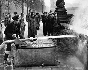 Curious Gallery: Blitz in London -- demonstrating deluge set, WW2
