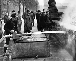 Curiosity Prints: Blitz in London -- demonstrating deluge set, WW2