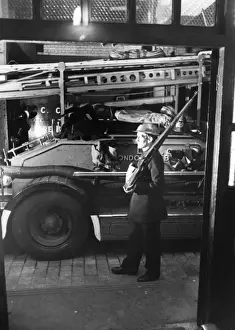 Guarding Prints: Blitz in London -- night at an AFS station, WW2