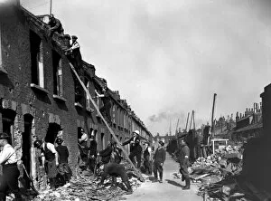 Terraced Collection: Blitz in London -- rescue workers in bombed street, WW2
