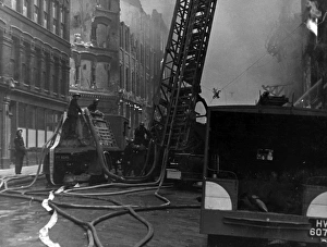 Fireman with hosepipe