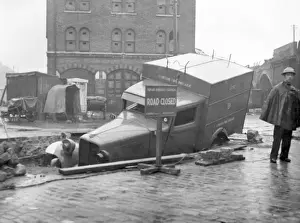 Blitz in London -- vehicle in bomb crater