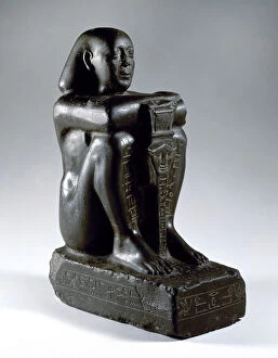 Block statue of Harsomtusemhat (664-610 B.C.). Basalt. Lower