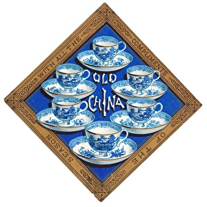 Teatime Collection: Blue and white china cups and saucers on a Christmas card