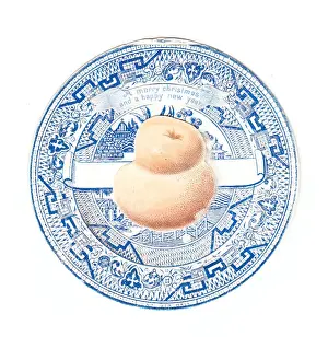 Blue and white plate with bread on a Christmas card