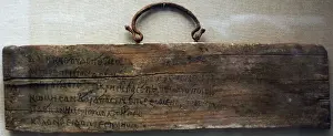 Word Prints: Board of wood inscribed in ink with lines 468-473 of Book I