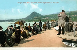 Binoculars Prints: Boat trippers observe Sugarloaf Mountain, NY, USA