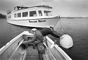 Images Dated 16th May 2019: Boatman with Rutland Water pleasure cruiser, Rutland Belle