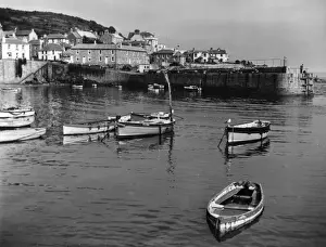 Mousehole Prints: Boats in the harbour at Mousehole, Cornwall, England. Date: 1950s
