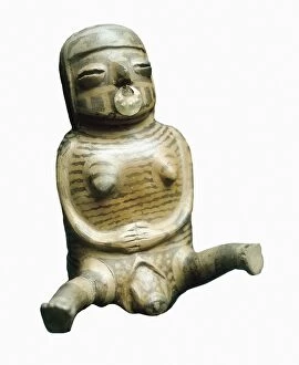 Bottle with female form and gold nose ring. Childbirth