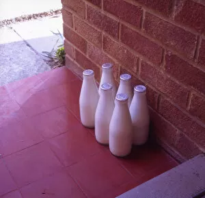 Images Dated 10th June 2019: Six bottles of silver-top milk on the doorstep
