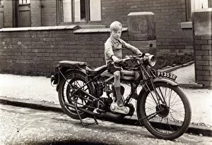 Triumph Gallery: Boy on a 1923 / 4 Triumph motorcycle