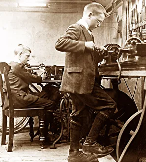Boy apprentices in a workshop