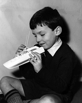 Images Dated 9th September 2011: BOY & BOAT