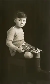 Boy with Book on Lap