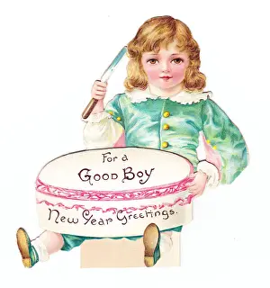 Boy with a cake on a cutout New Year card