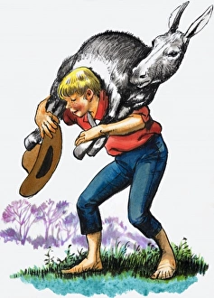 Images Dated 31st October 2006: Boy carrying a donkey