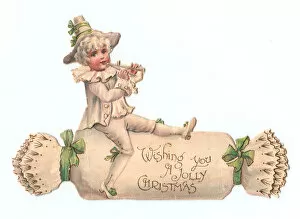 Images Dated 11th December 2015: Boy on a cutout card in the shape of a Christmas cracker