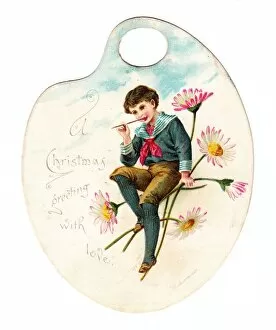 Images Dated 23rd November 2015: Boy with daisies on a palette-shaped Christmas card