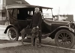Airedale Gallery: A boy, his dog and a car