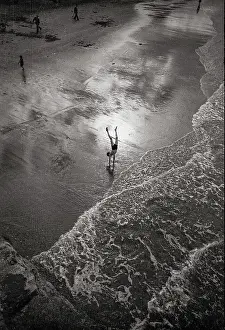 Clear Prints: Boy alone doing handstand on beach in Yorkshire Date: 1947 - 1948