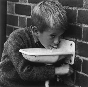 Thirsty Collection: BOY AT DRINKING FOUNTAIN