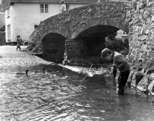 Allerford Gallery: Boy Fishing, Packhorse Bridge, Allerford, Somerset